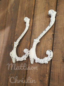 2 Distressed White Cast Iron Victorian Hooks